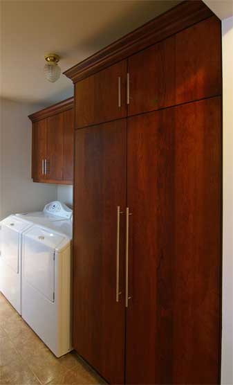 laundry room - cherry cabinets