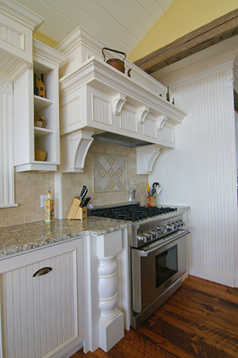 beautiful stove area cabinetry