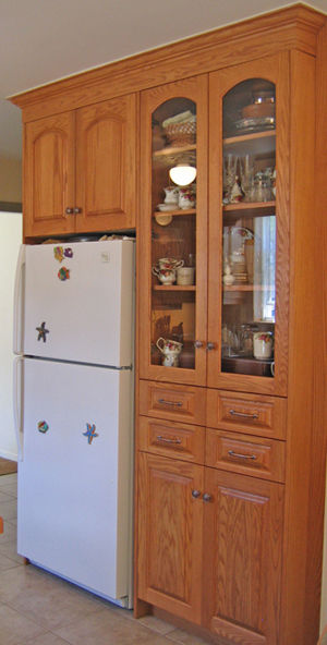 cabinets around a fridge